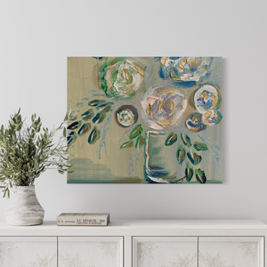 Abstract painting on a wall above a white console table with decorative items.

