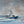 Boat in rough water with a stormy sky