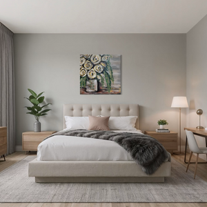 Modern bedroom with a bed, desk, and decor elements.