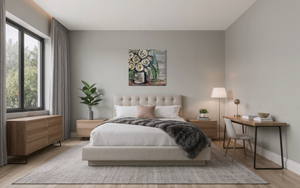Modern bedroom with a bed, desk, and decor elements.