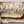 Painting of 'The Last Supper' on a wall with decorative elements below.